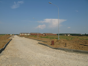 5 июня 2014. Строительство асфальтированной дорожной сети поселка