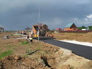 12 июня 2014. Строительство асфальтированной дорожной сети поселка