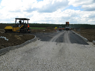 12 июня 2014. Строительство асфальтированной дорожной сети поселка