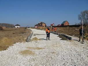 21 апреля 2014. Строительство асфальтированной дорожной сети поселка