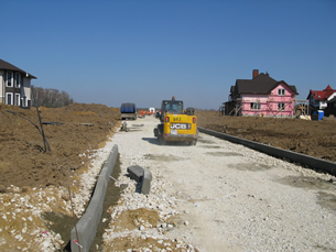24 марта 2014. Строительство асфальтированной дорожной сети поселка, проездов и тротуаров
